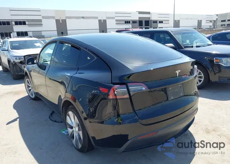 2023 Tesla Model Y Awd/Long Range Dual Motor All-Wheel Drive z USA, uszkodzony, nr VIN 7SAYGAEE9PF899481